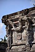 Candi Panataran - Naga Temple. Priestly figure and corner naga. 